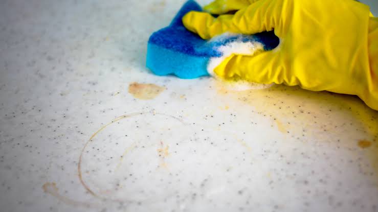 cleaning a granite countertop